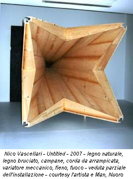 Nico Vascellari - Untitled - 2007 - legno naturale, legno bruciato, campane, corda da arrampicata, variatore meccanico, fieno, fuoco - veduta parziale dell'installazione - courtesy l'artista e Man, Nuoro
