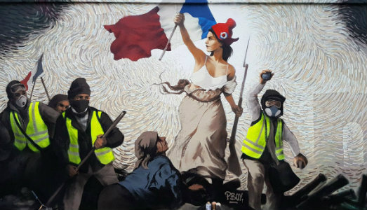 Mille dollari nascosti nel murales dei Gilet Jaunes. A Parigi parte la caccia al tesoro
